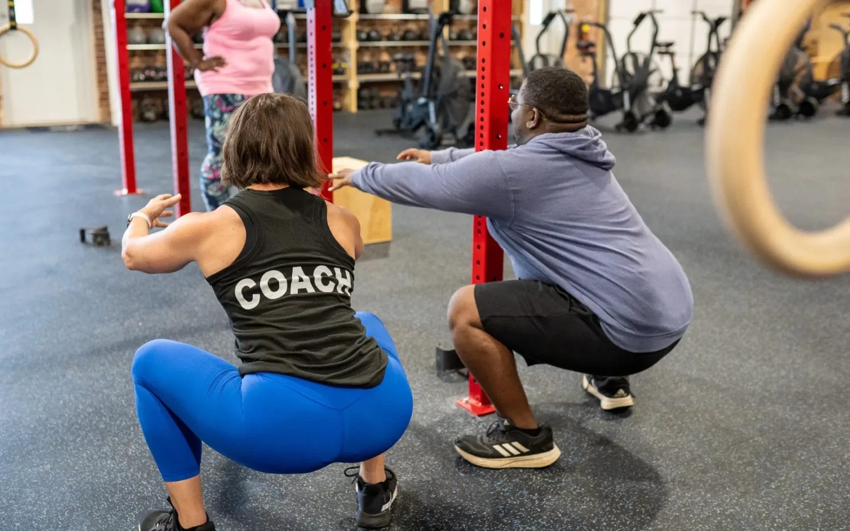 coach and client do squats