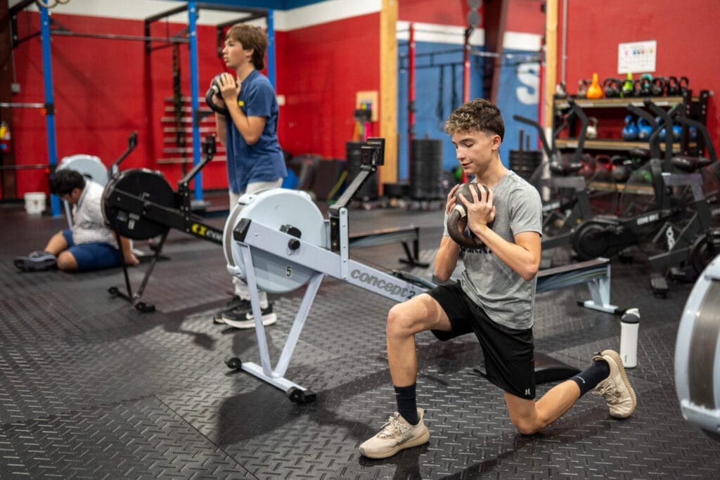 Our youth fitness program provides structure for kids to build strength and confidence.